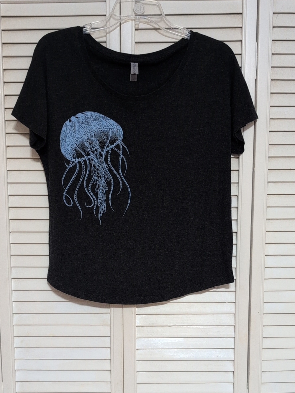 Next Level Apparel Black Tee with Light Blue Jellyfish Graphic, Size Medium